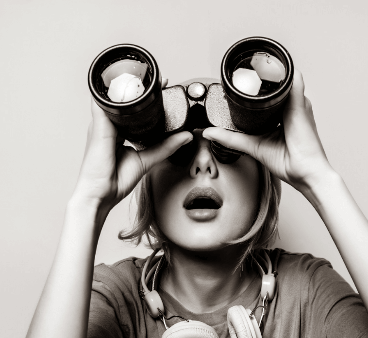 Woman Searching With Binoculars